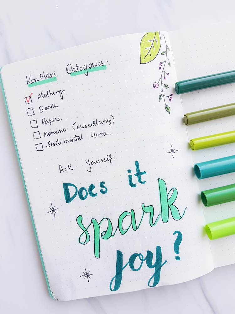 22 bullet journal cleaning spreads to keep your home squeaky clean- Konmari spread bullet journal