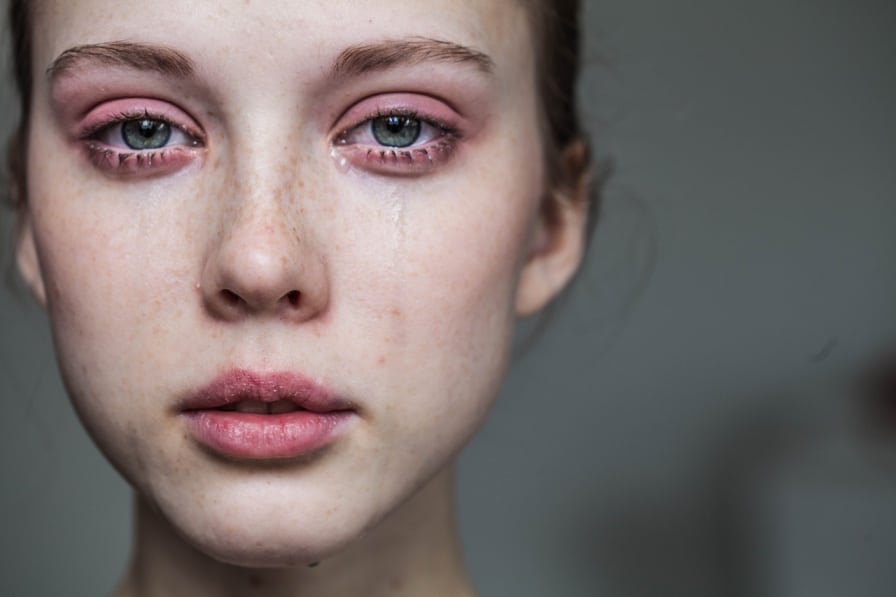 a girl crying-stay hopeful in tough times