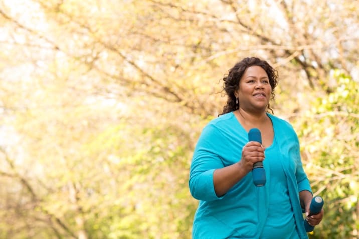 A plus-sized woman running to stay fit (believing in yourself and taking tiny steps)
